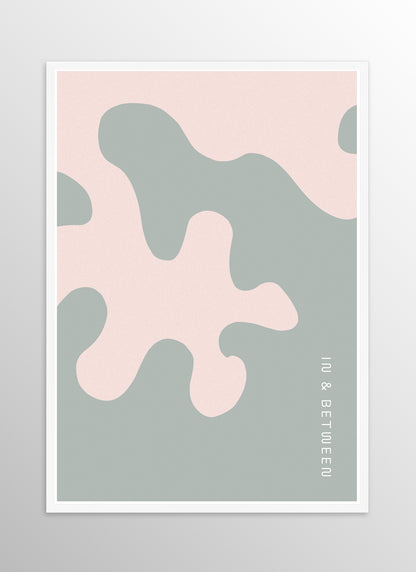 Art print of large soft pink oak leaf on grey background in white wooden frame.