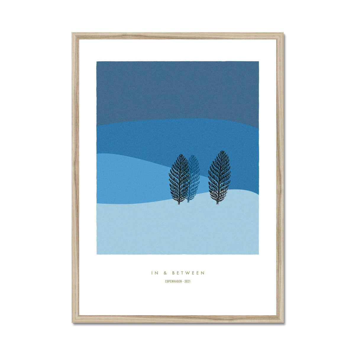 Winter landscape in dark and light blue tones with two trees and natural wooden frame.