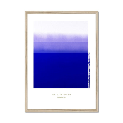 Art print depicting blue violet horizon in natural wood frame.